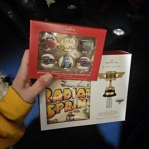 Hallmark Disney Cars Radiator Springs Ornament Set and Tree Topper With Skirt